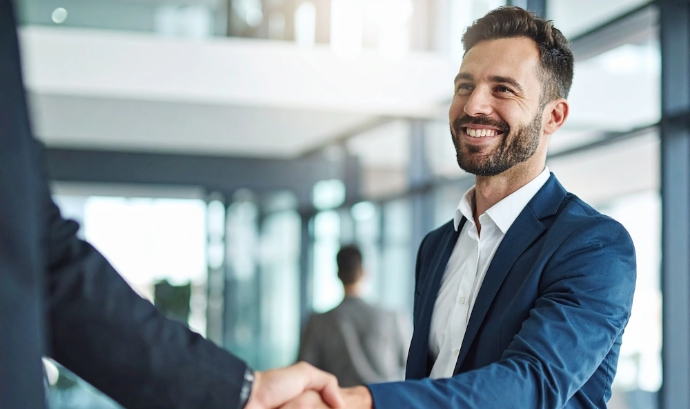 Man satisfied with purchase, handshake